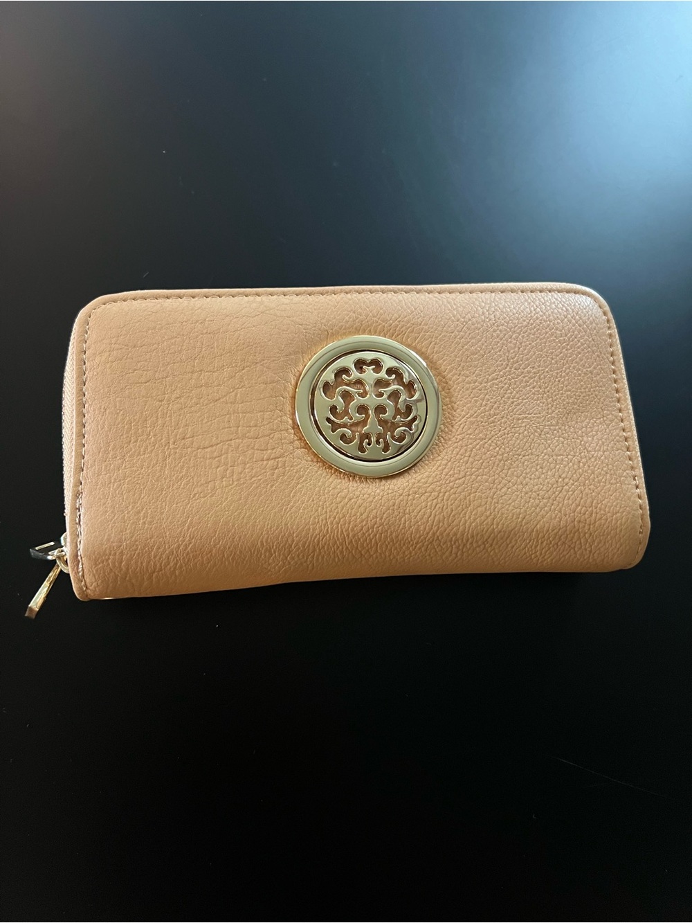 Women’s clutch or wristlet zip around tan wallet